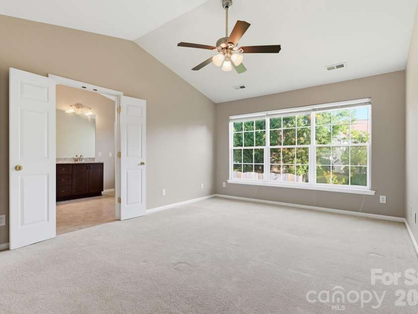 5219 Bentgrass Run Drive, Charlotte, NC 28269.  MLS# CAR4399258, YatesRealty ID 38901. Primary Bedroom