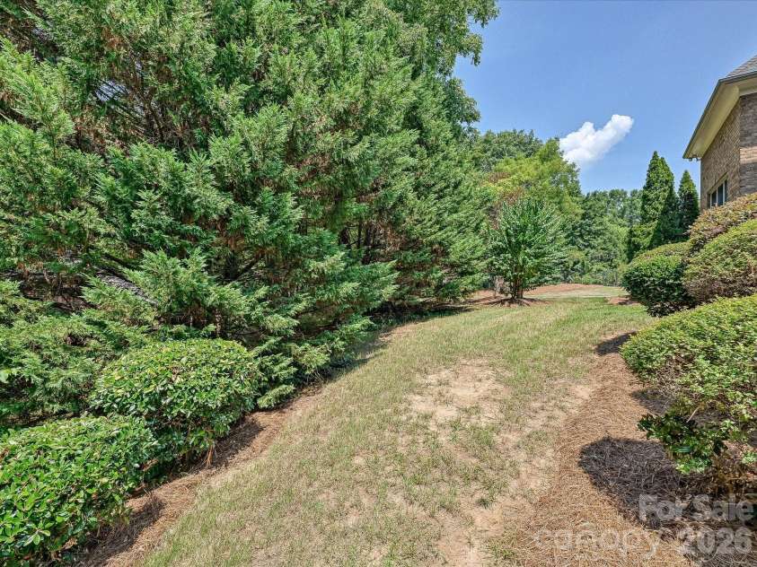 6806 Larrisa Court, Charlotte, NC 28226.  MLS# CAR4333871, YatesRealty ID 38909. Backyard