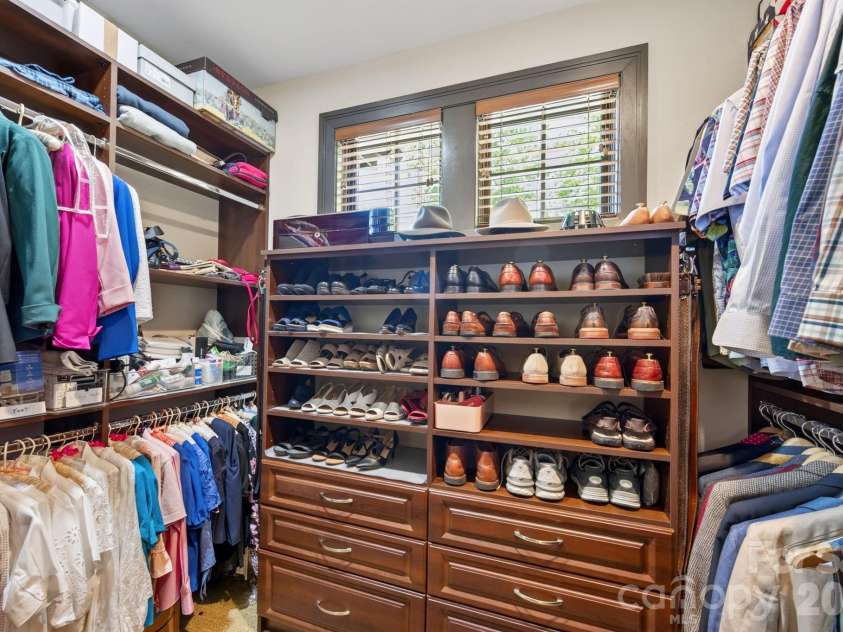 33 Hawks Branch Circle, Fairview, NC 28730.  MLS# CAR4403173, YatesRealty ID 38919. Custom walk-in closet with built-in shelving and storage