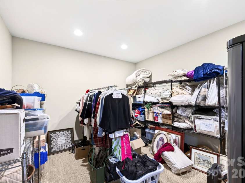 33 Hawks Branch Circle, Fairview, NC 28730.  MLS# CAR4403173, YatesRealty ID 38919. Generous lower-level storage room with additional closet space