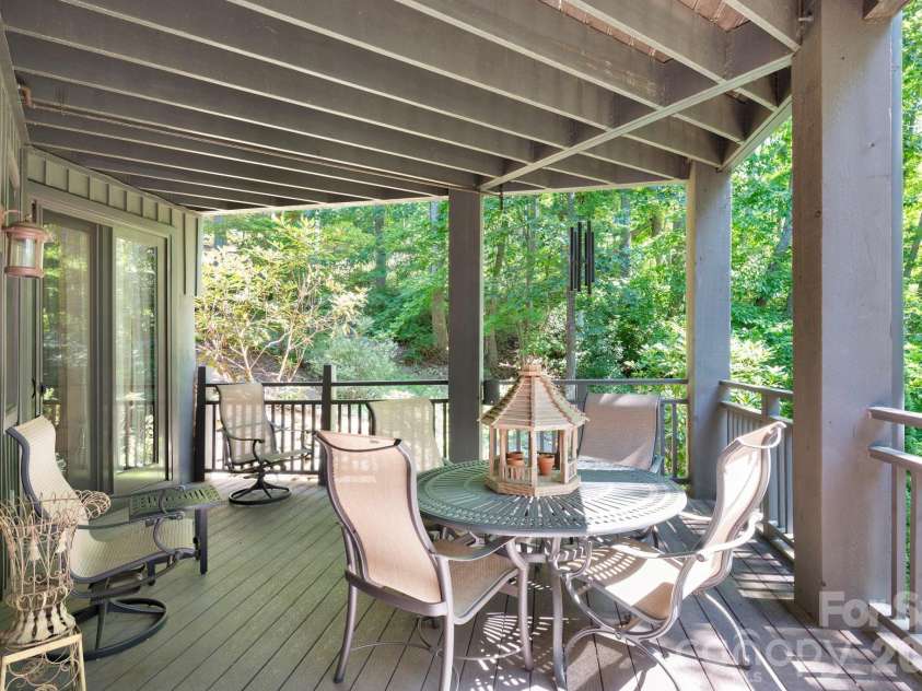 33 Hawks Branch Circle, Fairview, NC 28730.  MLS# CAR4403173, YatesRealty ID 38919. Lower-level covered deck with direct access to the Southcliff trail system