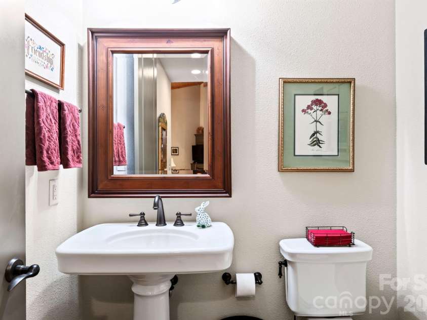 33 Hawks Branch Circle, Fairview, NC 28730.  MLS# CAR4403173, YatesRealty ID 38919. Main level half bath