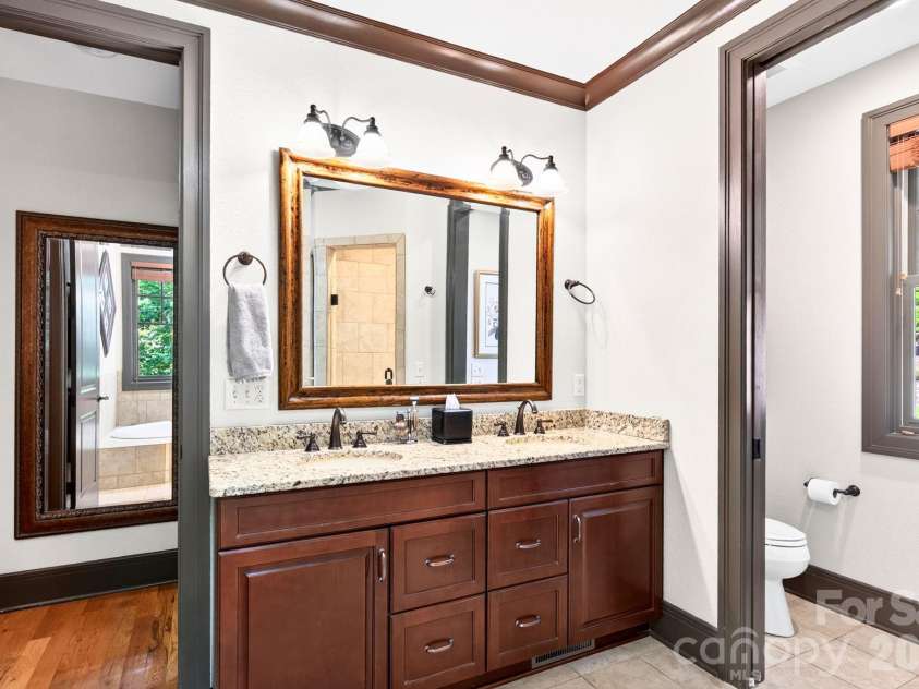 33 Hawks Branch Circle, Fairview, NC 28730.  MLS# CAR4403173, YatesRealty ID 38919. Primary bath with dual vanity and generous storage