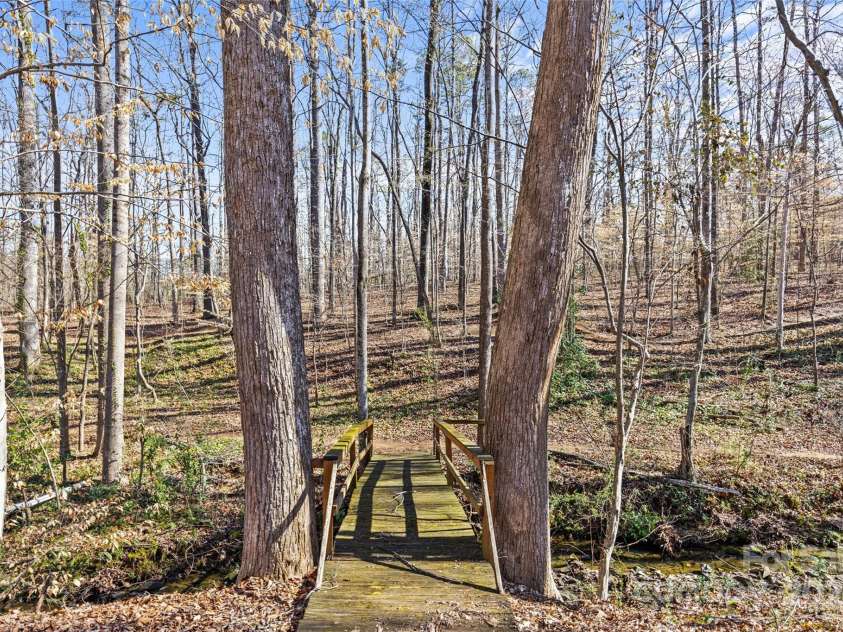 2913 Archdale Drive, Charlotte, NC 28210.  MLS# CAR4232043, YatesRealty ID 3892. Your property connects to the Park Rd Park biking trails (and the Greenway!)