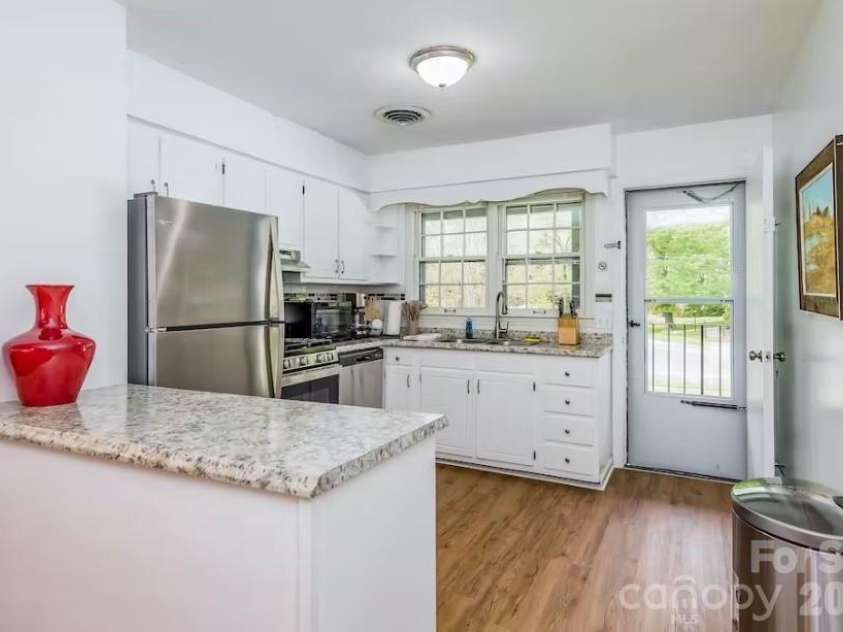 1150 Blue Ridge Road, Flat Rock, NC 28731.  MLS# CAR4408723, YatesRealty ID 38921. 