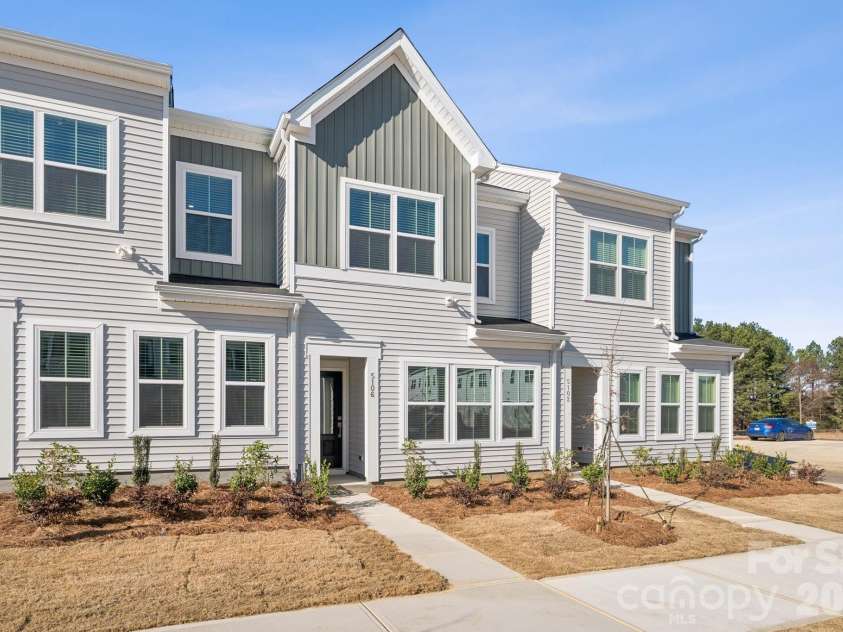 5106 Orchardview Way, Charlotte, NC 28216.  MLS# CAR4335326, YatesRealty ID 3893. Front Exterior (Rear load garage)