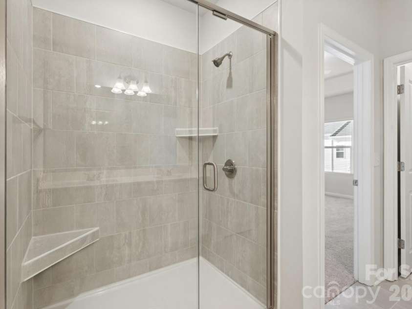 5106 Orchardview Way, Charlotte, NC 28216.  MLS# CAR4335326, YatesRealty ID 3893. Primary Bath walk-in tiled shower