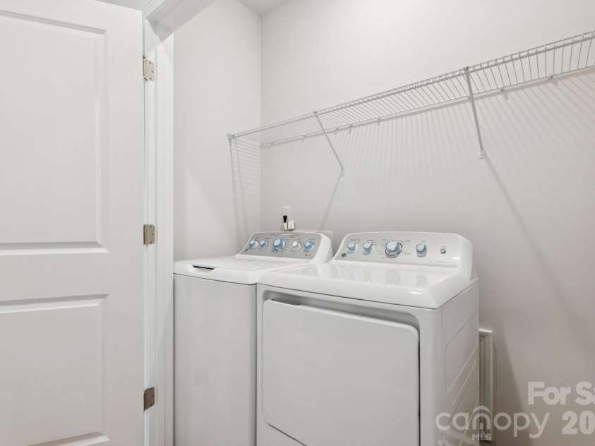 5106 Orchardview Way, Charlotte, NC 28216.  MLS# CAR4335326, YatesRealty ID 3893. Upstairs Laundry