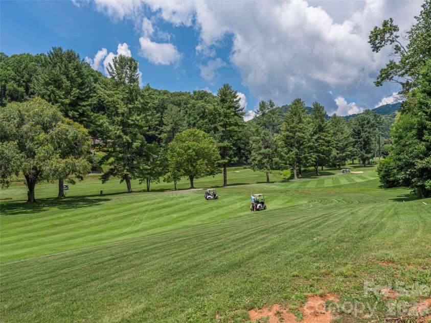 1560 Country Club Drive, Maggie Valley, NC 28751.  MLS# CAR4406398, YatesRealty ID 38937. 