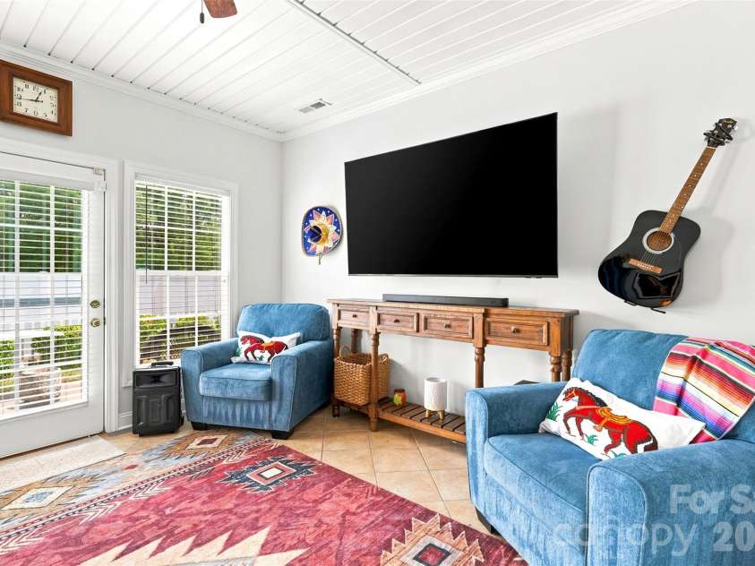 1248 Curry Way, Matthews, NC 28104.  MLS# CAR4406039, YatesRealty ID 38938. Sunroom- brings in great natural light