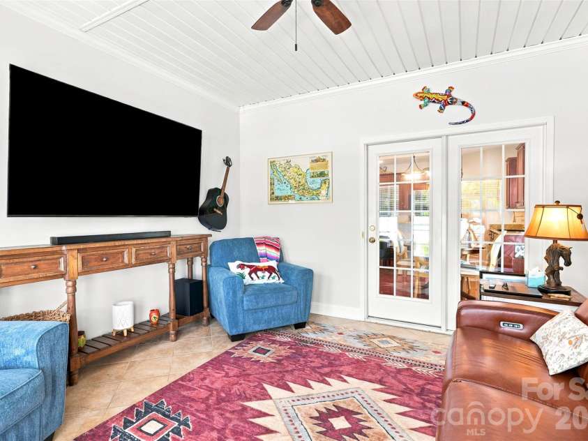 1248 Curry Way, Matthews, NC 28104.  MLS# CAR4406039, YatesRealty ID 38938. Sunroom- brings in great natural light