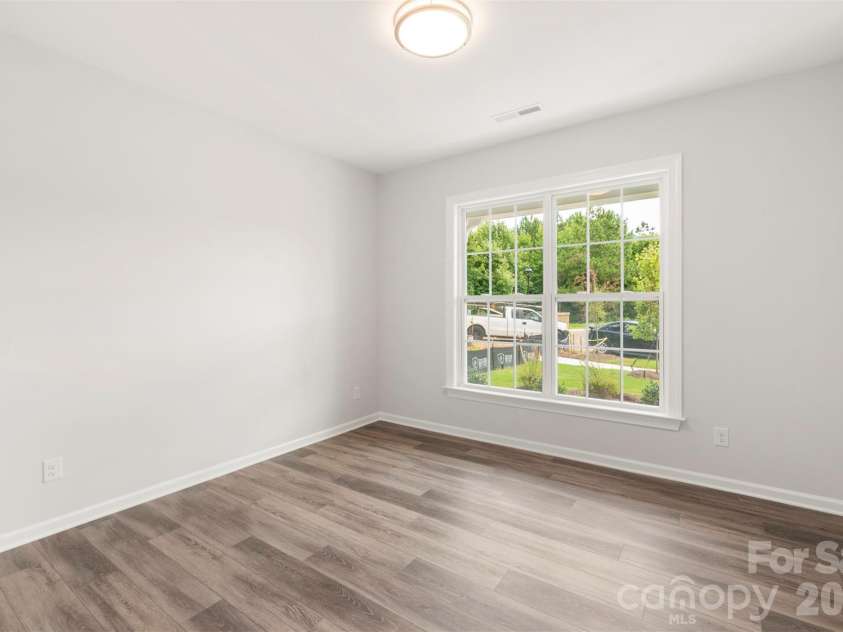 4800 Glen Stripe Drive, Indian Trail, NC 28079.  MLS# CAR4367168, YatesRealty ID 38944. Example Photo - Bedroom 5/Flex Room (1st Floor)
