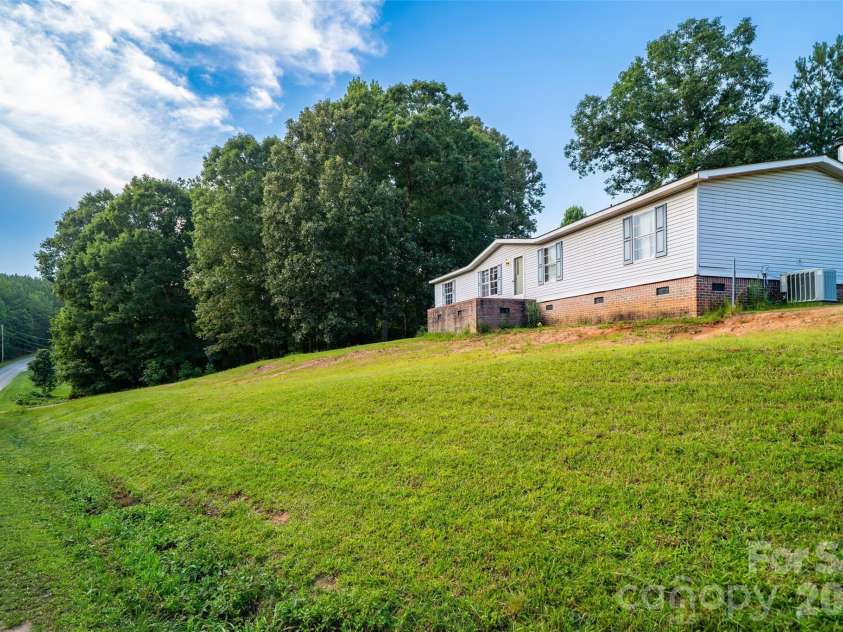 479 McDade Road, Tryon, NC 28782.  MLS# CAR4406506, YatesRealty ID 38949. 