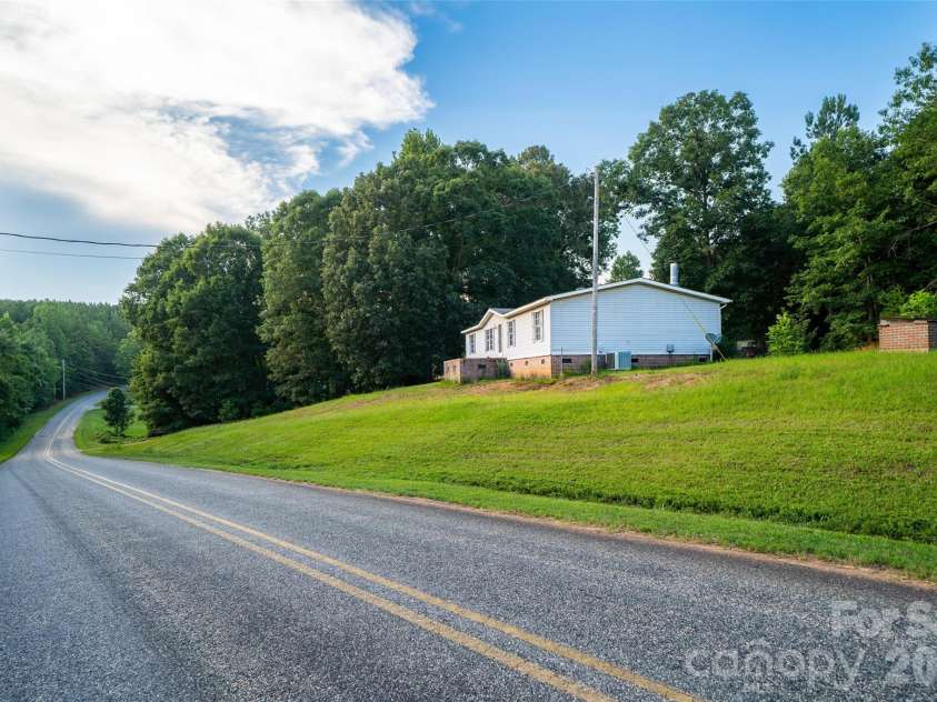 479 McDade Road, Tryon, NC 28782.  MLS# CAR4406506, YatesRealty ID 38949. 