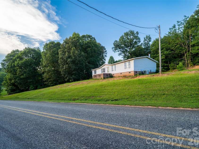 479 McDade Road, Tryon, NC 28782.  MLS# CAR4406506, YatesRealty ID 38949. 