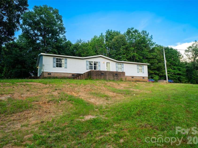 479 McDade Road, Tryon, NC 28782.  MLS# CAR4406506, YatesRealty ID 38949. 