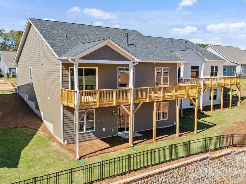2085 Bonds Lane, Fort Mill, SC 29715.  MLS# CAR4257392, YatesRealty ID 3895. Covered rear porch overlooking golf course