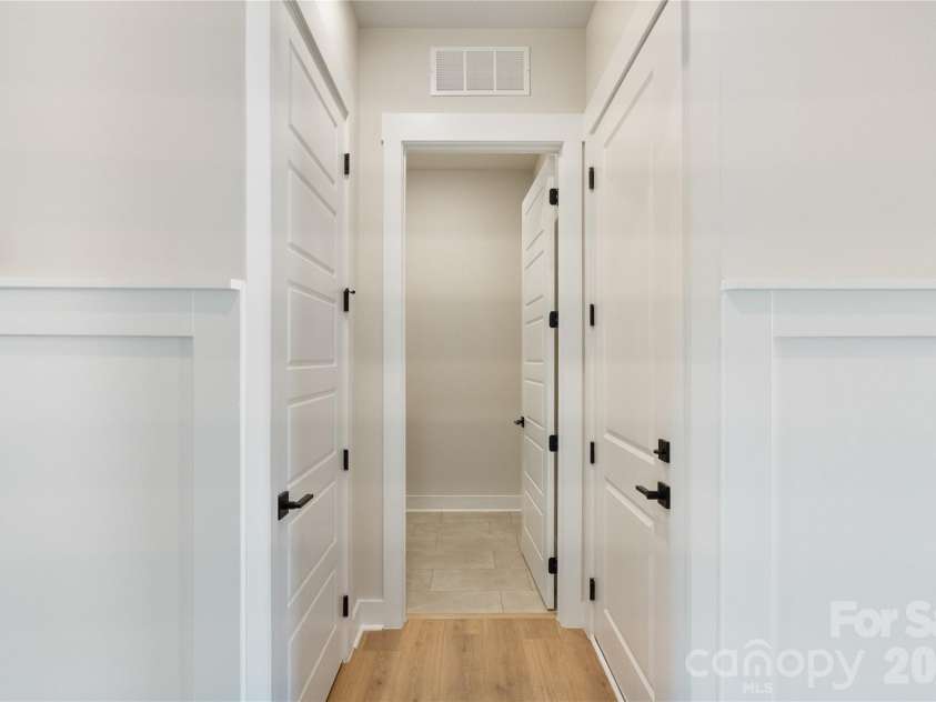 2085 Bonds Lane, Fort Mill, SC 29715.  MLS# CAR4257392, YatesRealty ID 3895. Hallway with custom trim details