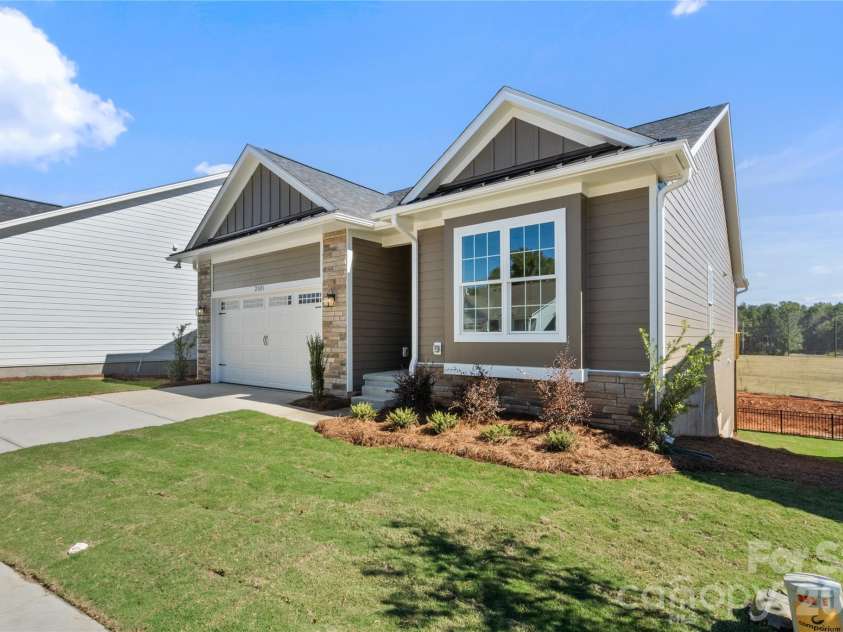 2085 Bonds Lane, Fort Mill, SC 29715.  MLS# CAR4257392, YatesRealty ID 3895. Side elevation showcasing exterior design