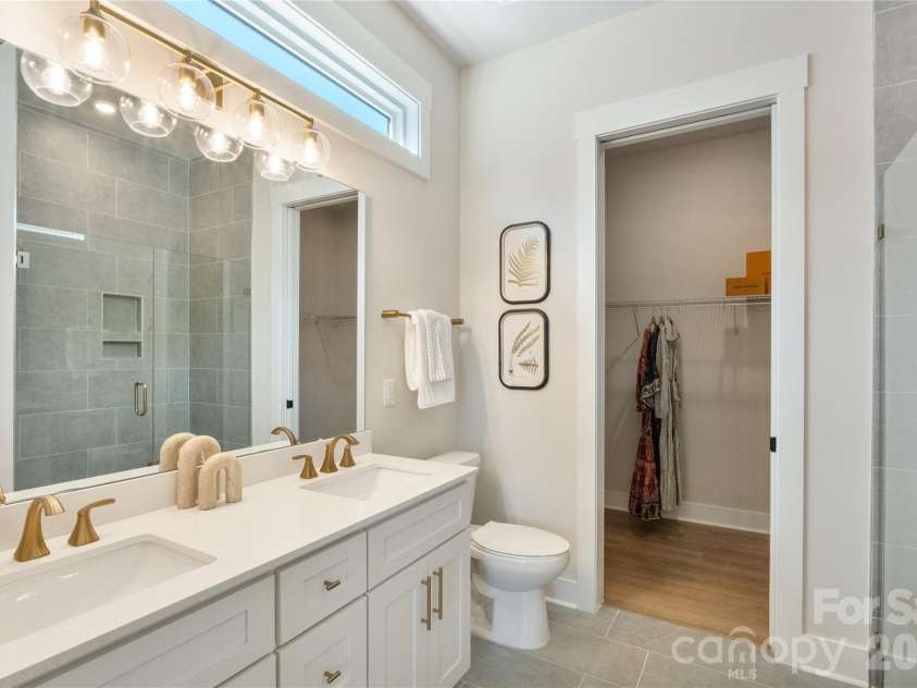 2085 Bonds Lane, Fort Mill, SC 29715.  MLS# CAR4257392, YatesRealty ID 3895. Spa-inspired primary bathroom