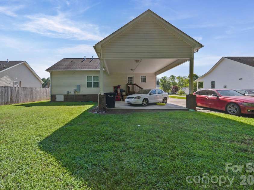 414 East Village Drive, Monroe, NC 28112.  MLS# CAR4406542, YatesRealty ID 38957. 