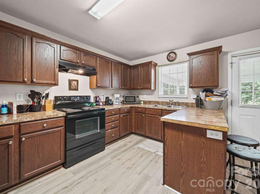 414 East Village Drive, Monroe, NC 28112.  MLS# CAR4406542, YatesRealty ID 38957. 