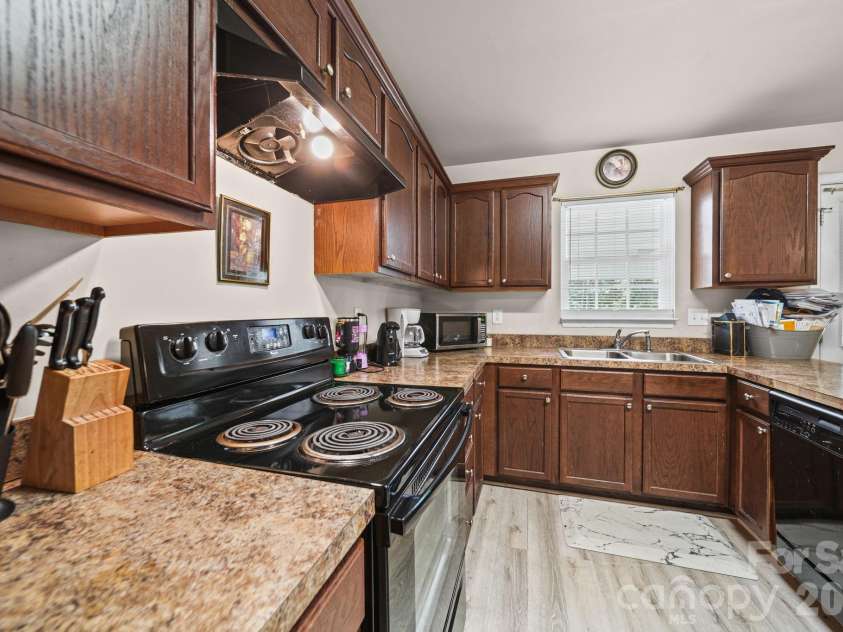 414 East Village Drive, Monroe, NC 28112.  MLS# CAR4406542, YatesRealty ID 38957. 