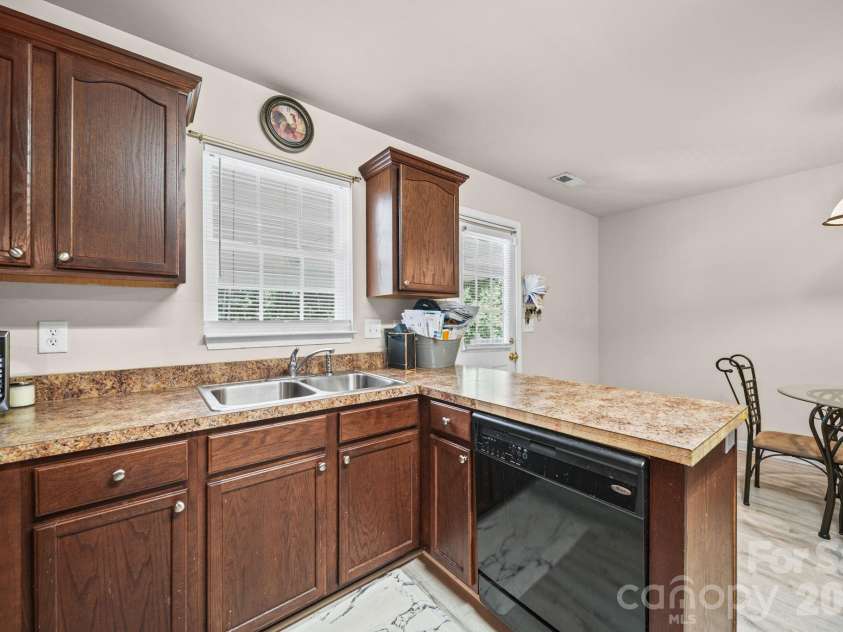 414 East Village Drive, Monroe, NC 28112.  MLS# CAR4406542, YatesRealty ID 38957. 