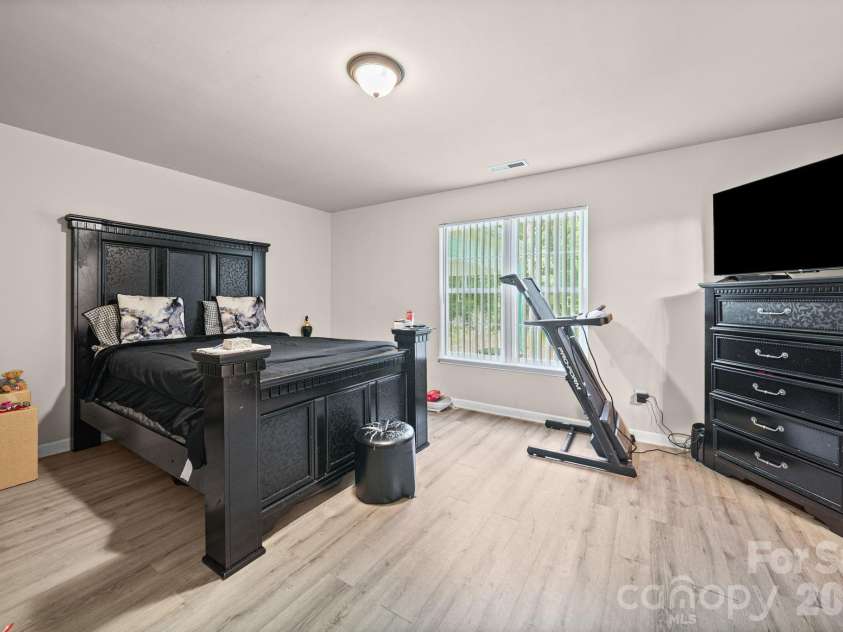 414 East Village Drive, Monroe, NC 28112.  MLS# CAR4406542, YatesRealty ID 38957. Primary bedroom