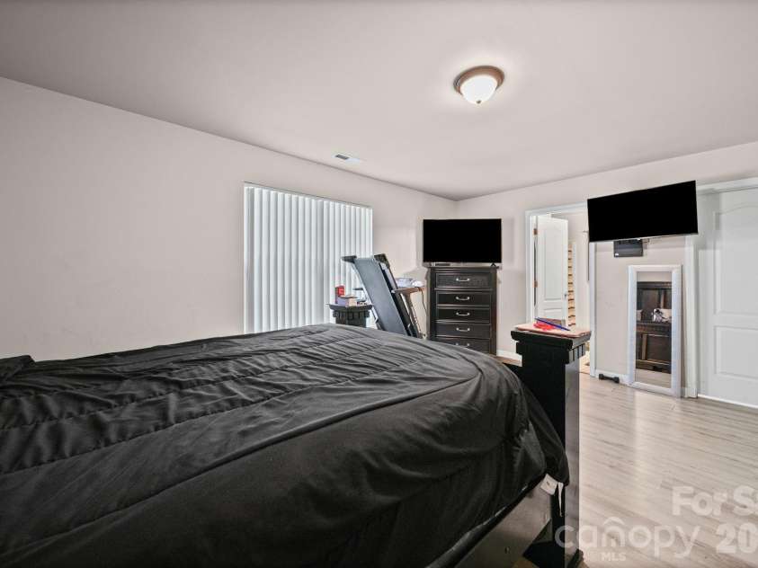 414 East Village Drive, Monroe, NC 28112.  MLS# CAR4406542, YatesRealty ID 38957. Primary bedroom