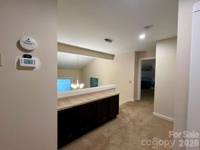 200 Foxlair Court, Matthews, NC 28105.  MLS# CAR4405914, YatesRealty ID 38966. Open Hallway