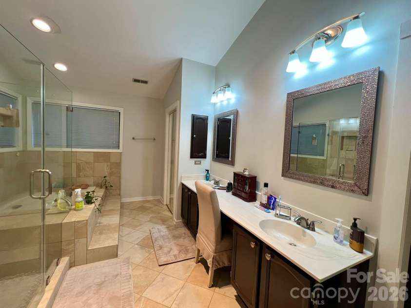 200 Foxlair Court, Matthews, NC 28105.  MLS# CAR4405914, YatesRealty ID 38966. Primary Bath