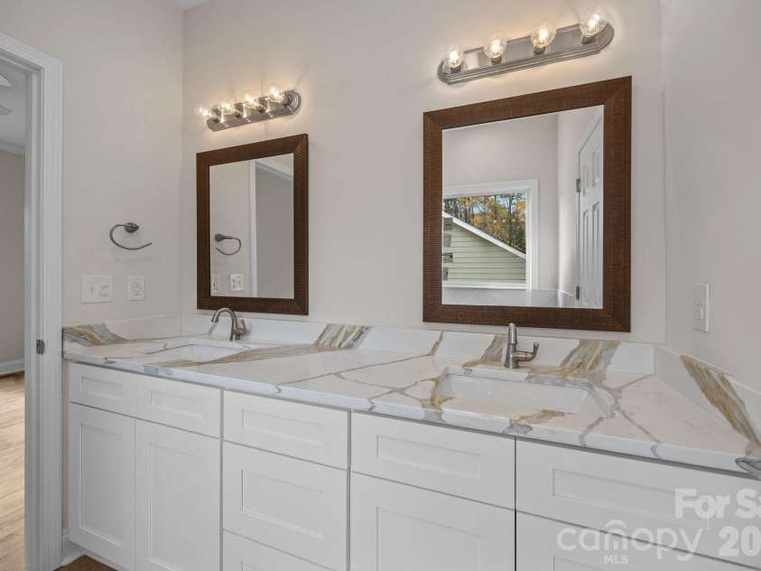1270 Shaver Street, Salisbury, NC 28144.  MLS# CAR4293122, YatesRealty ID 3897. Primary bath with dual sinks