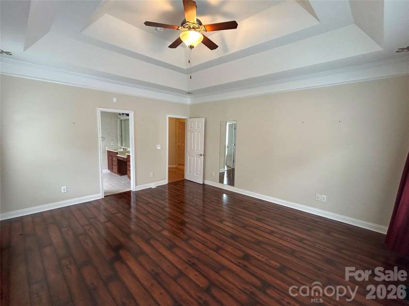3968 Troon Drive, Concord, NC 28027.  MLS# CAR4405391, YatesRealty ID 38970. Primary Bedroom with tray ceiling.