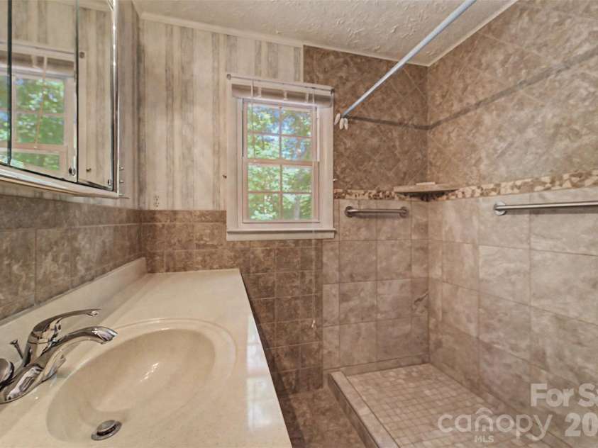 1747 University Heights Road, Cullowhee, NC 28723.  MLS# CAR4387686, YatesRealty ID 38972. 