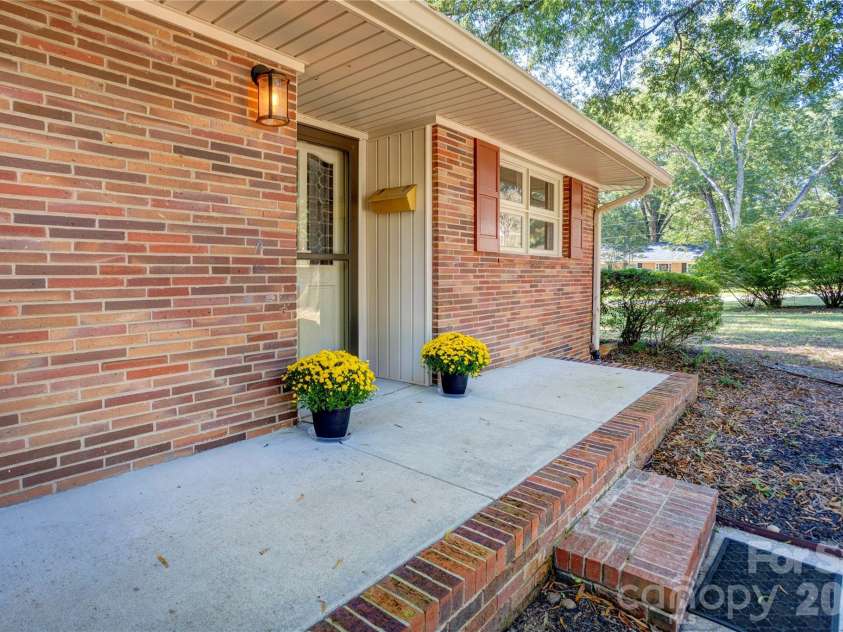 688 Grandview Drive, Concord, NC 28025.  MLS# CAR4433877, YatesRealty ID 38977. Side porch entry