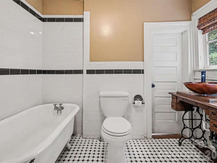 75 Cabarrus Avenue, Concord, NC 28025.  MLS# CAR4406575, YatesRealty ID 38993. Bathroom Downstairs