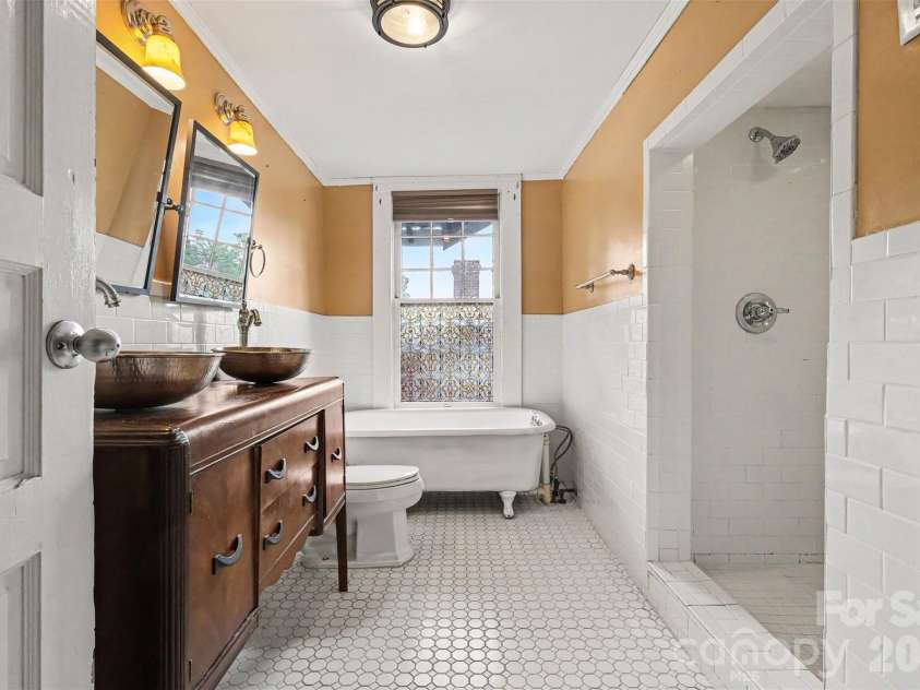 75 Cabarrus Avenue, Concord, NC 28025.  MLS# CAR4406575, YatesRealty ID 38993. Bathroom Upstairs
