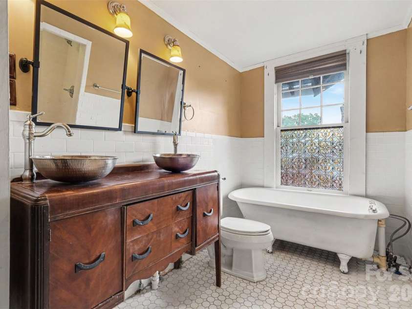 75 Cabarrus Avenue, Concord, NC 28025.  MLS# CAR4406575, YatesRealty ID 38993. Bathroom Upstairs
