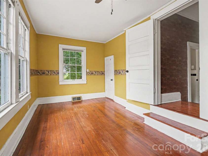 75 Cabarrus Avenue, Concord, NC 28025.  MLS# CAR4406575, YatesRealty ID 38993. Bedroom Downstairs