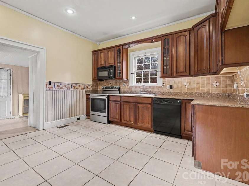 75 Cabarrus Avenue, Concord, NC 28025.  MLS# CAR4406575, YatesRealty ID 38993. Kitchen