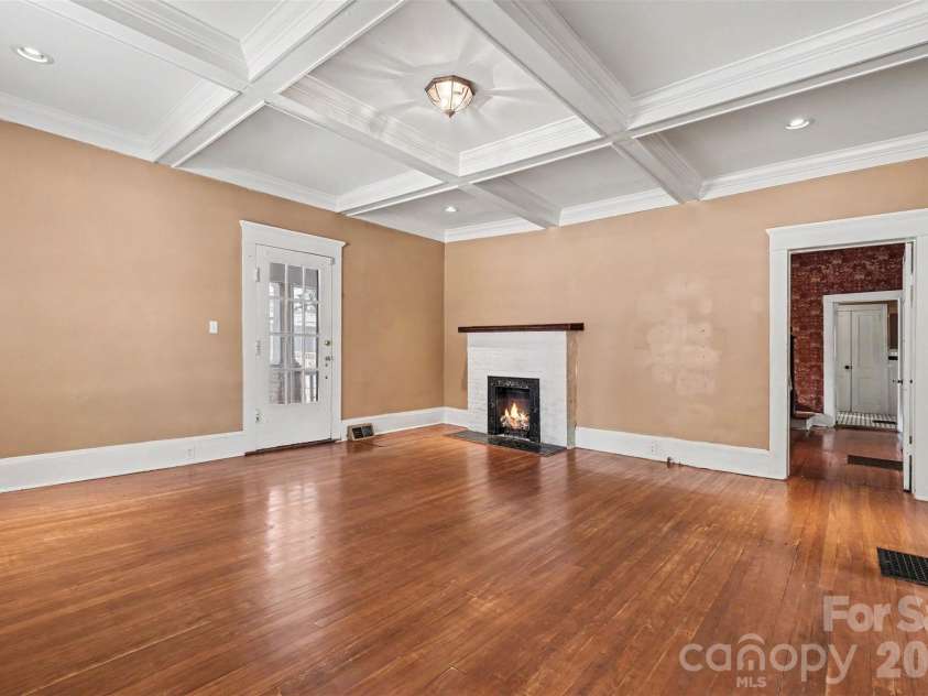 75 Cabarrus Avenue, Concord, NC 28025.  MLS# CAR4406575, YatesRealty ID 38993. Living Room