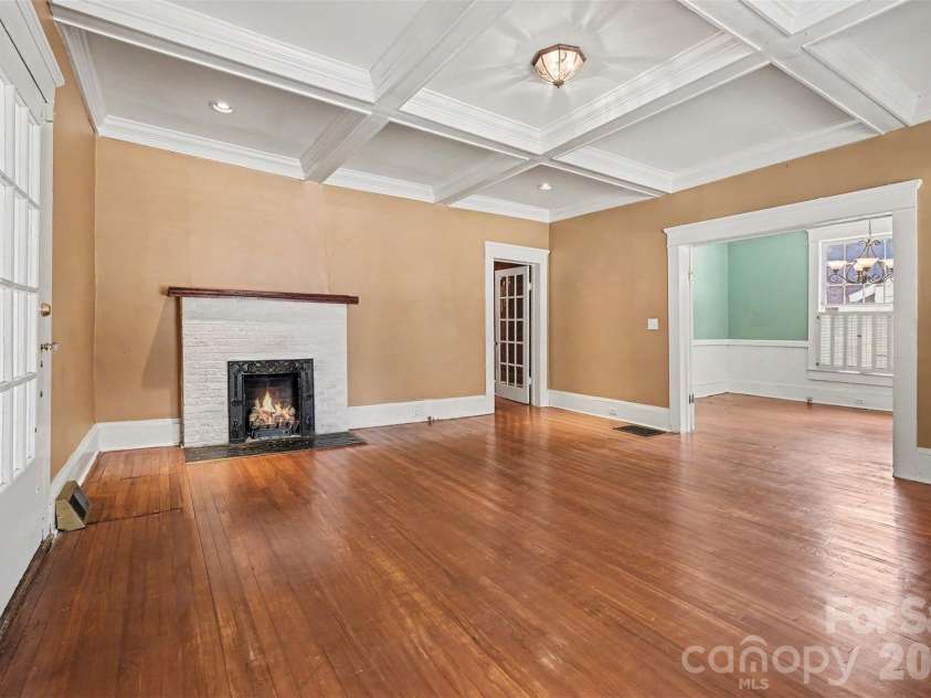 75 Cabarrus Avenue, Concord, NC 28025.  MLS# CAR4406575, YatesRealty ID 38993. Living Room