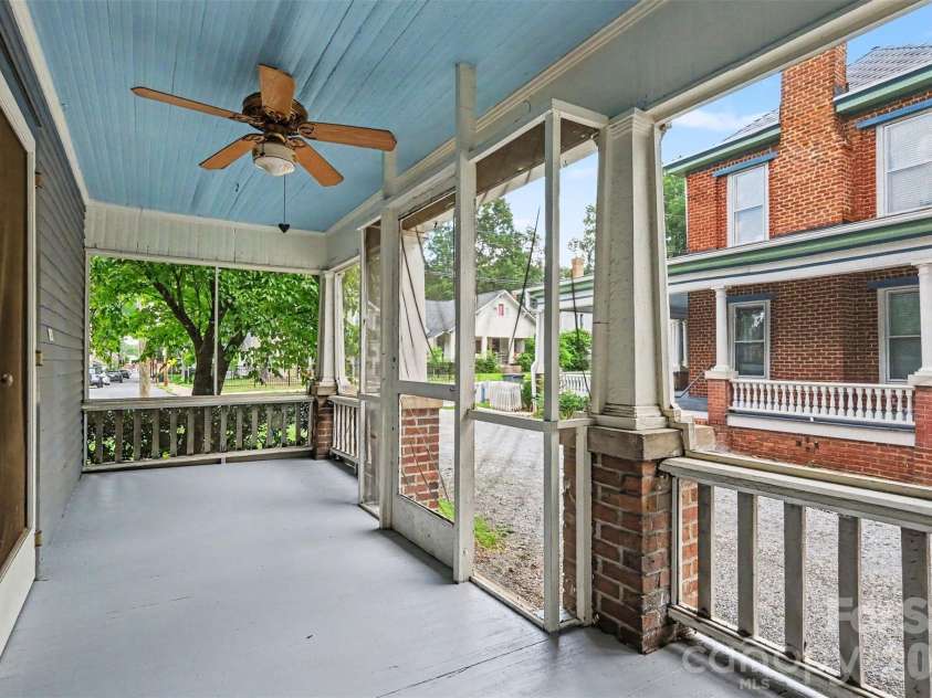 75 Cabarrus Avenue, Concord, NC 28025.  MLS# CAR4406575, YatesRealty ID 38993. Screen-In Porch