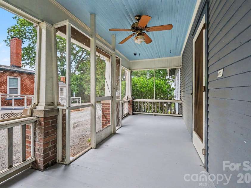 75 Cabarrus Avenue, Concord, NC 28025.  MLS# CAR4406575, YatesRealty ID 38993. Screen-In Porch