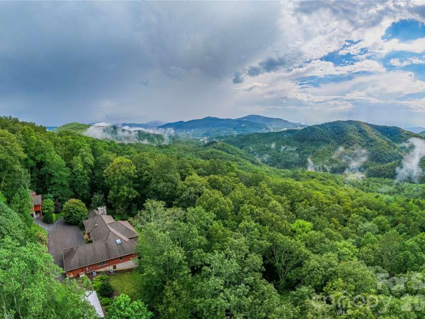 98 Flat Creek Road, Fairview, NC 28730.  MLS# CAR4395536, YatesRealty ID 38996. 238 acres of privacy