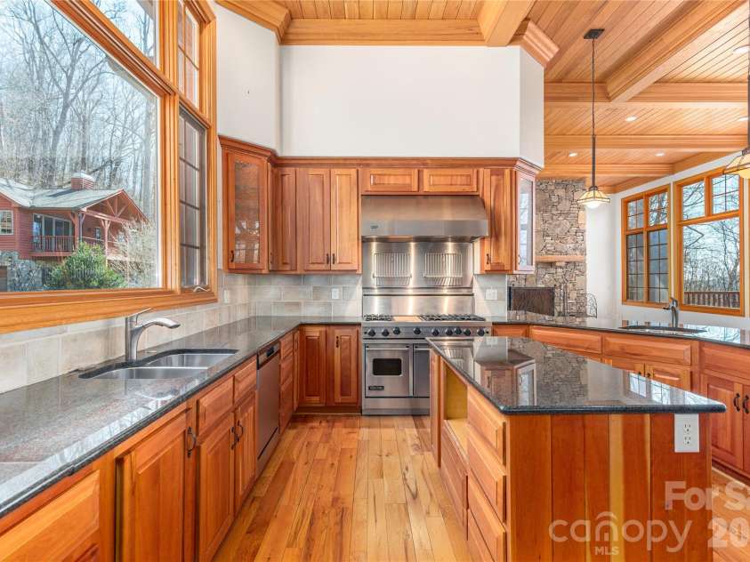 98 Flat Creek Road, Fairview, NC 28730.  MLS# CAR4395536, YatesRealty ID 38996. Custom cherry cabinet