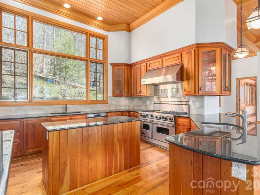 98 Flat Creek Road, Fairview, NC 28730.  MLS# CAR4395536, YatesRealty ID 38996. Gracious kitchen space