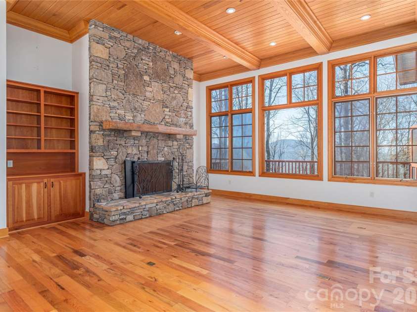 98 Flat Creek Road, Fairview, NC 28730.  MLS# CAR4395536, YatesRealty ID 38996. Large south-facing windows