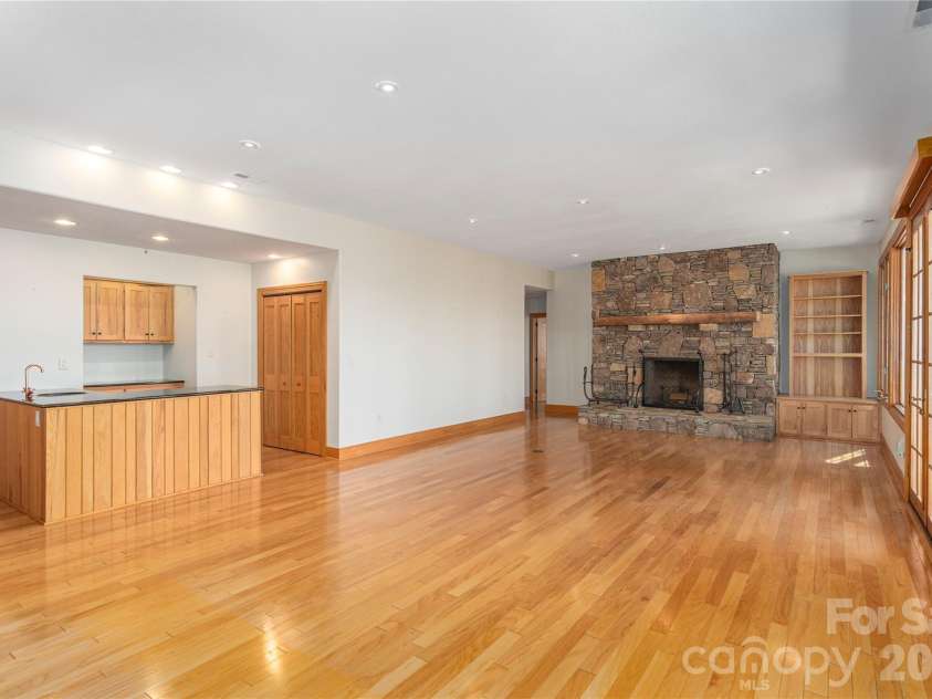98 Flat Creek Road, Fairview, NC 28730.  MLS# CAR4395536, YatesRealty ID 38996. Lowel-level family room